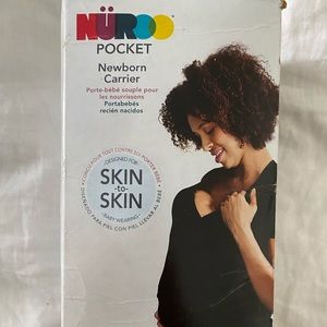 Nuroo M skin to skin baby wearing shirt